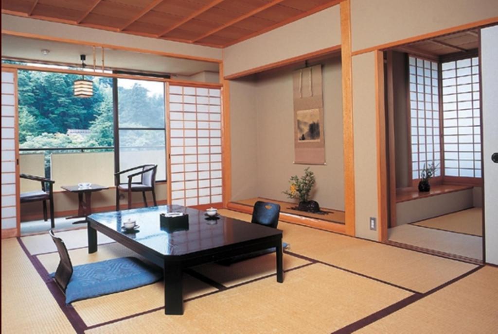 Kadonobo Ryokan Kobe Rum bild